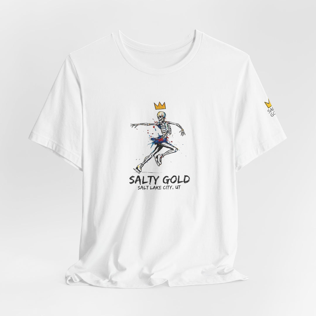 White Salty Gold skeleton figure skating tee with colorful graphic and gold crown.