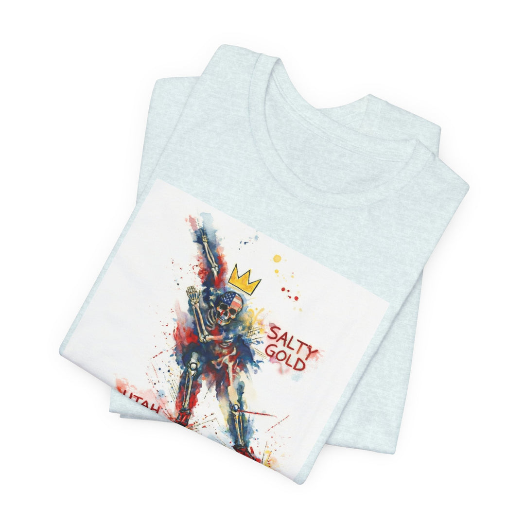 Light blue Salty Gold Long Track Skeleton Tee with watercolor red, white, blue skull and gold crown.