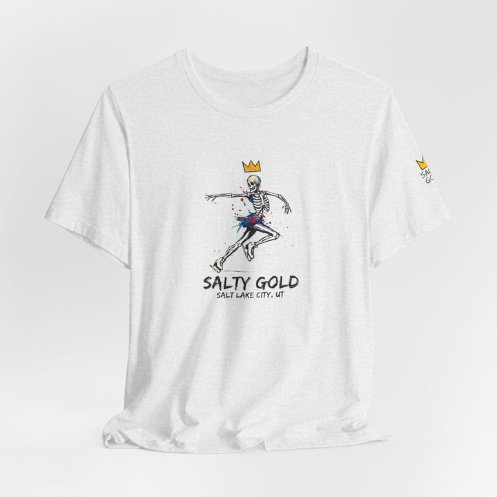 White Salty Gold tee with colorful skeleton figure skater, gold crown &amp; paint splatter. Salt Lake City UT.