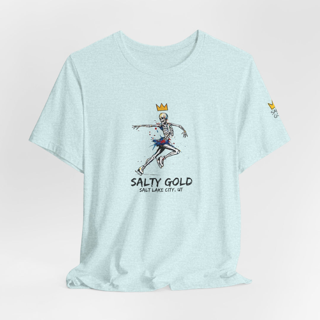 Light blue Salty Gold skeleton figure skating tee with gold crown and colorful splatters.