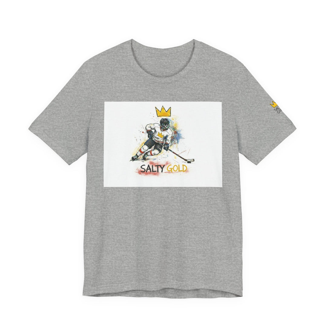 Grey Salty Gold tee w/ stylized hockey player, crown graphic &amp; colorful splashes. Olympic Oval Short Track.