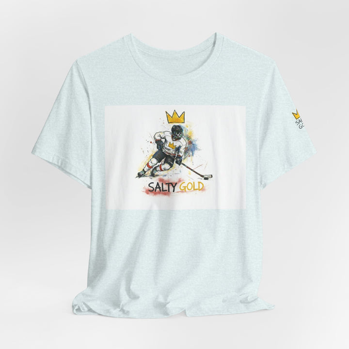 Light blue heather tee featuring Salty Gold Olympic short track skater graphic with crown and colorful splatters.