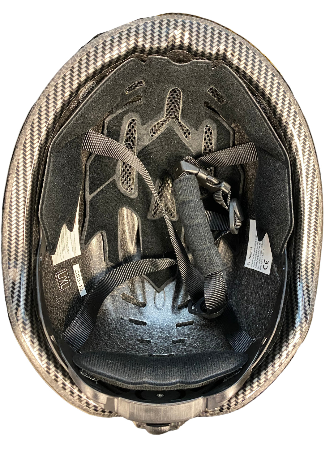 Black Consignment Skate Tech Helmet (L/XL) with carbon fiber shell, interior padding, and black straps.